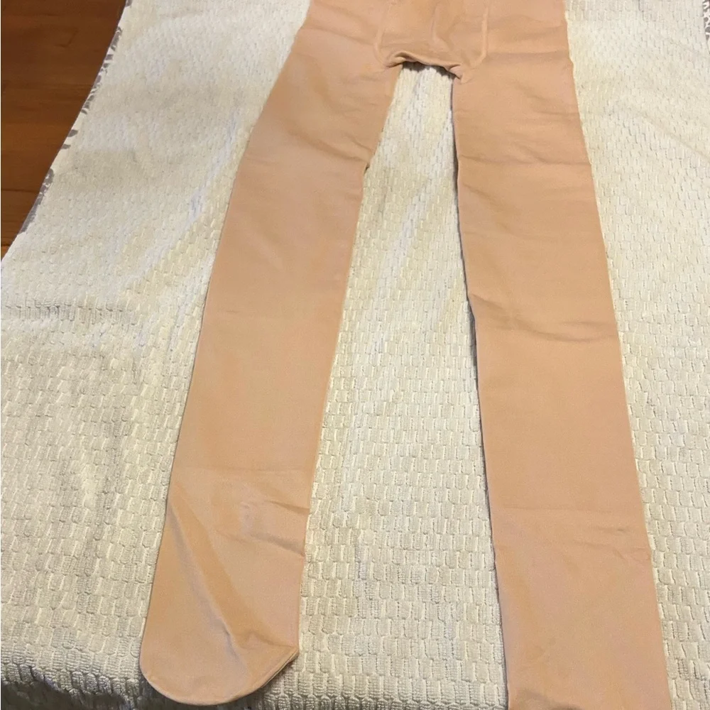 Source Unknown Tan tights